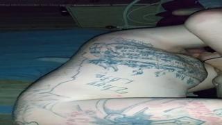Wickedly inked freak gets plundered by a rough-riding hornball from behind