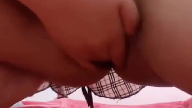 Cute Japanese goddess with enormous natural breasts wanks with a dildo on her webcam.